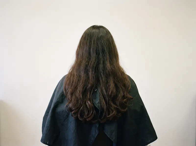 Después — melena larga y densa tras colocar las extensiones